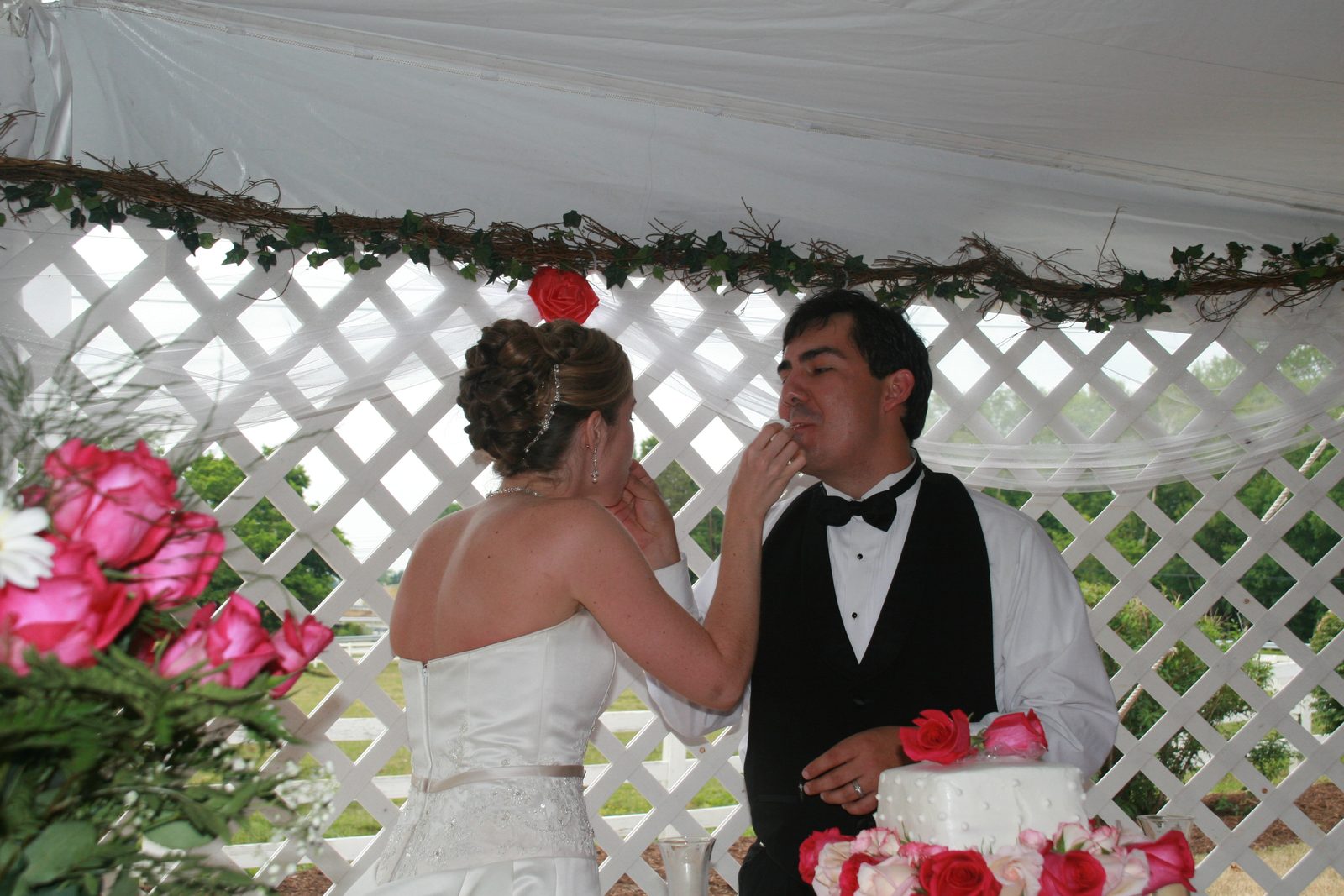 The traditionally first cake feeding.